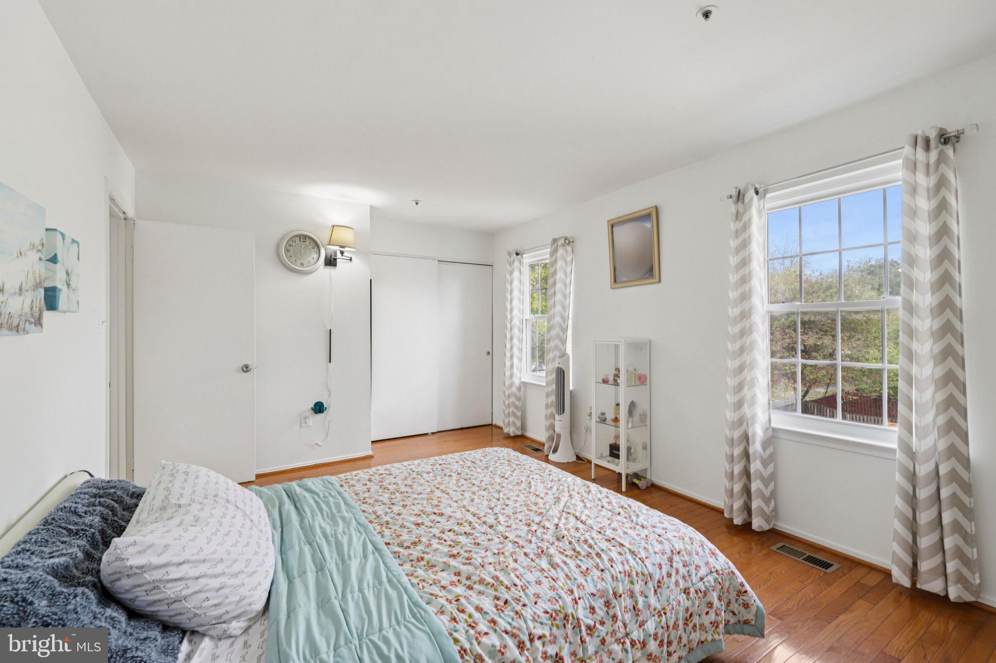 12014 Swallow Falls Court Silver Spring, MD 20904 - Photo 20 of 48 a bedroom with a bed and a window