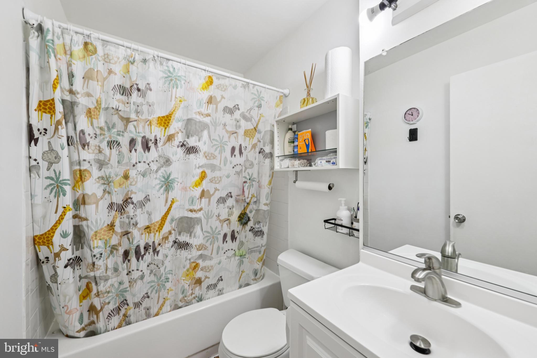 12014 Swallow Falls Court Silver Spring, MD 20904 - Photo 26 of 48 a bathroom with a sink and toilet