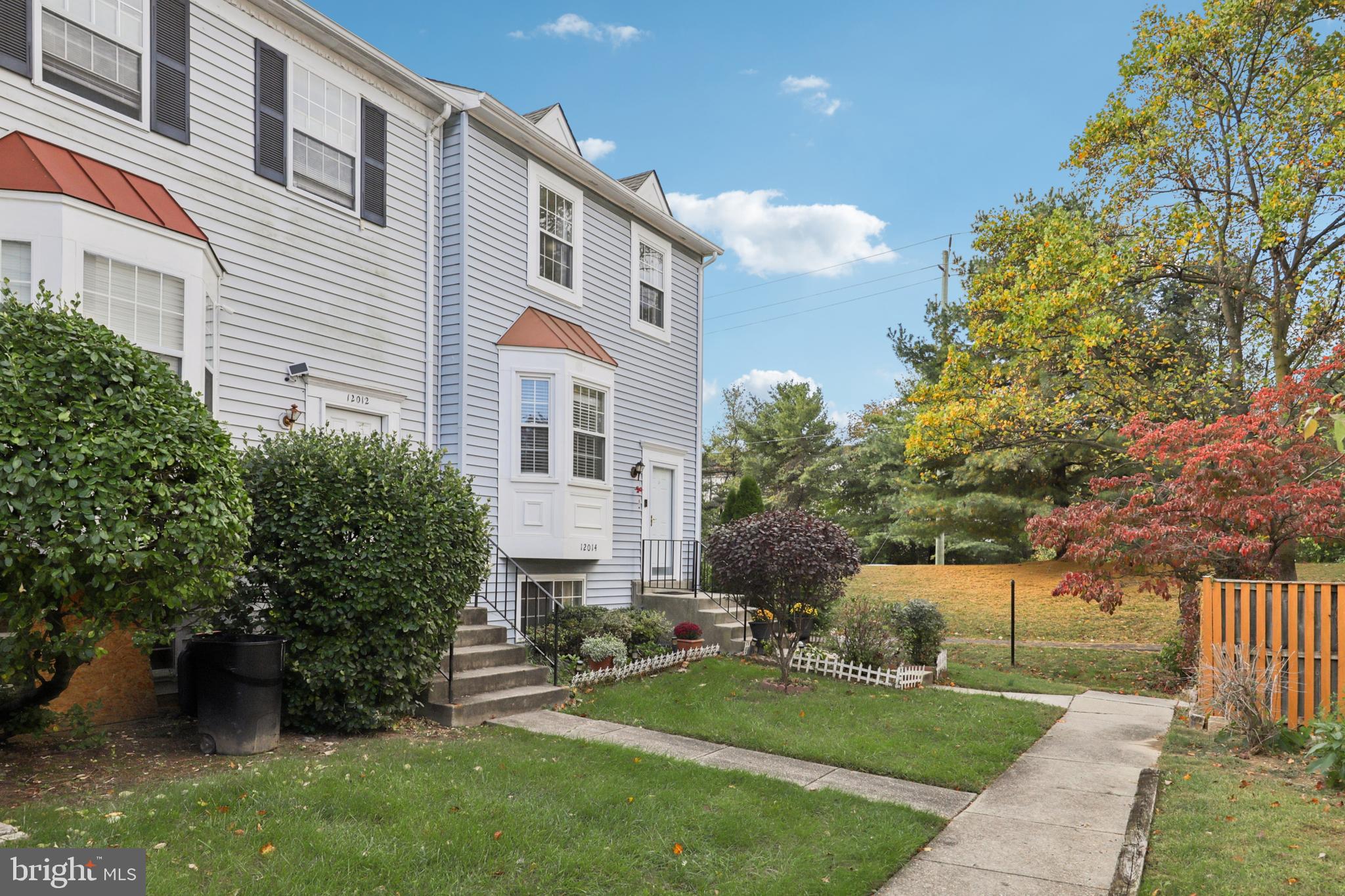 12014 Swallow Falls Court Silver Spring, MD 20904 - Photo 3 of 48 a front view of a house with a garden
