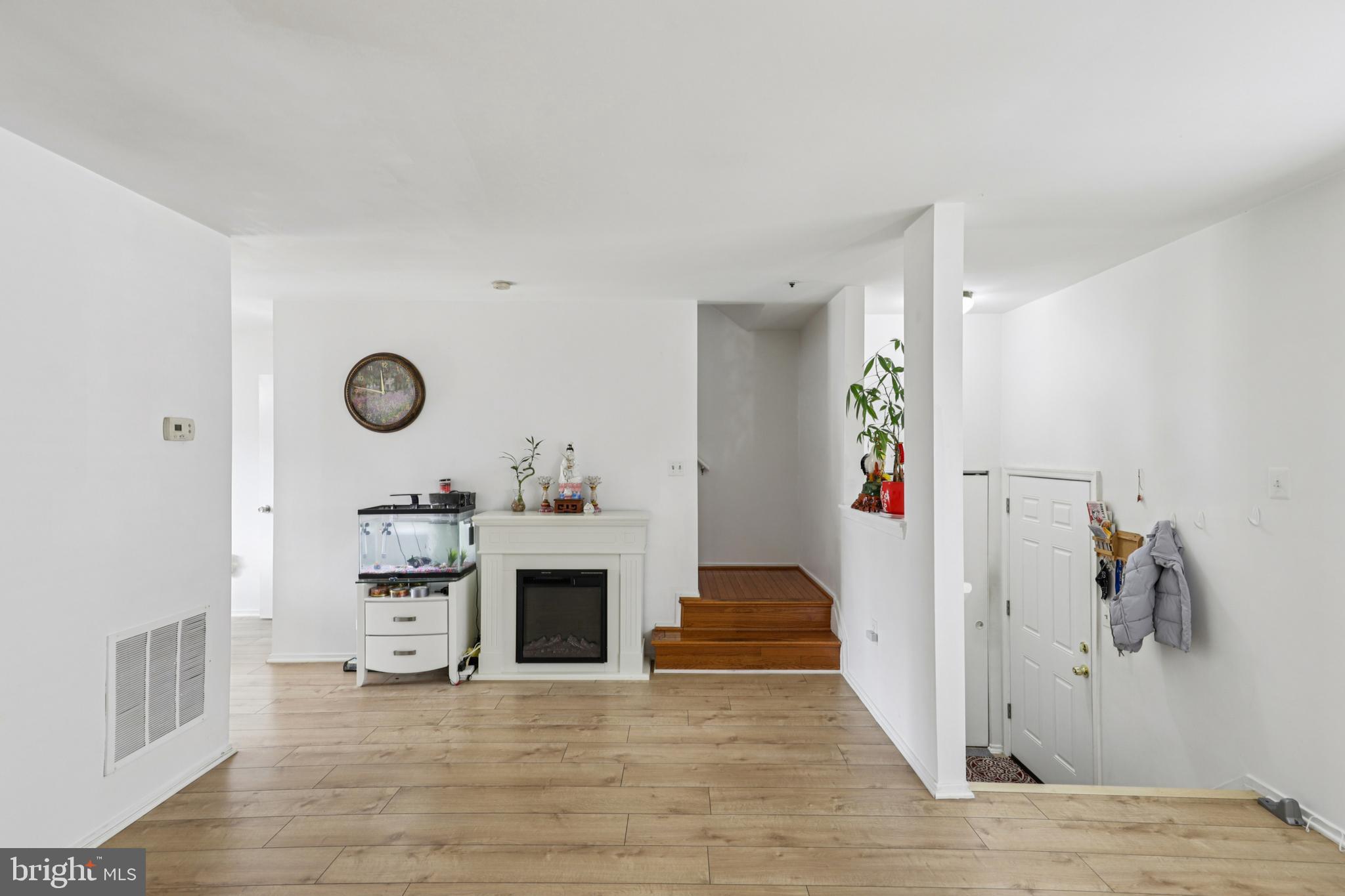 12014 Swallow Falls Court Silver Spring, MD 20904 - Photo 4 of 48 a view of a kitchen with a sink and a refrigerator