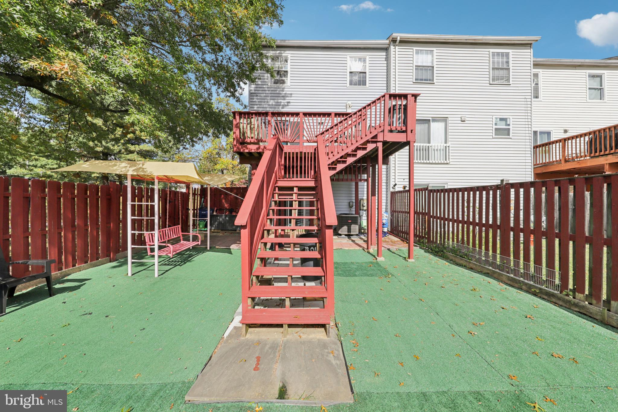 12014 Swallow Falls Court Silver Spring, MD 20904 - Photo 43 of 48 a view of a backyard with sitting area
