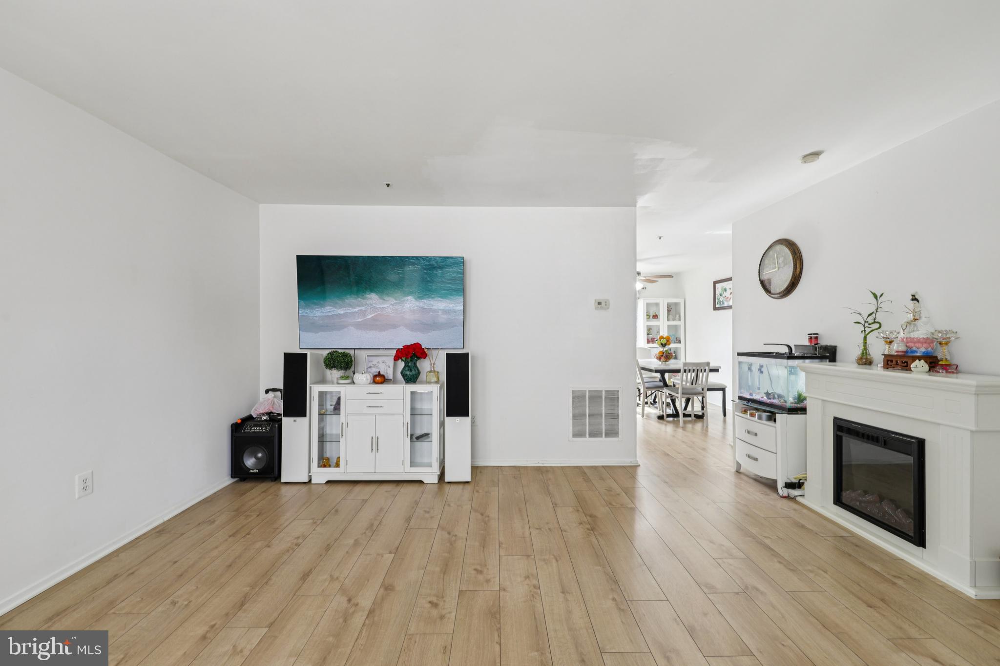 12014 Swallow Falls Court Silver Spring, MD 20904 - Photo 7 of 48 a living room with furniture and a fireplace