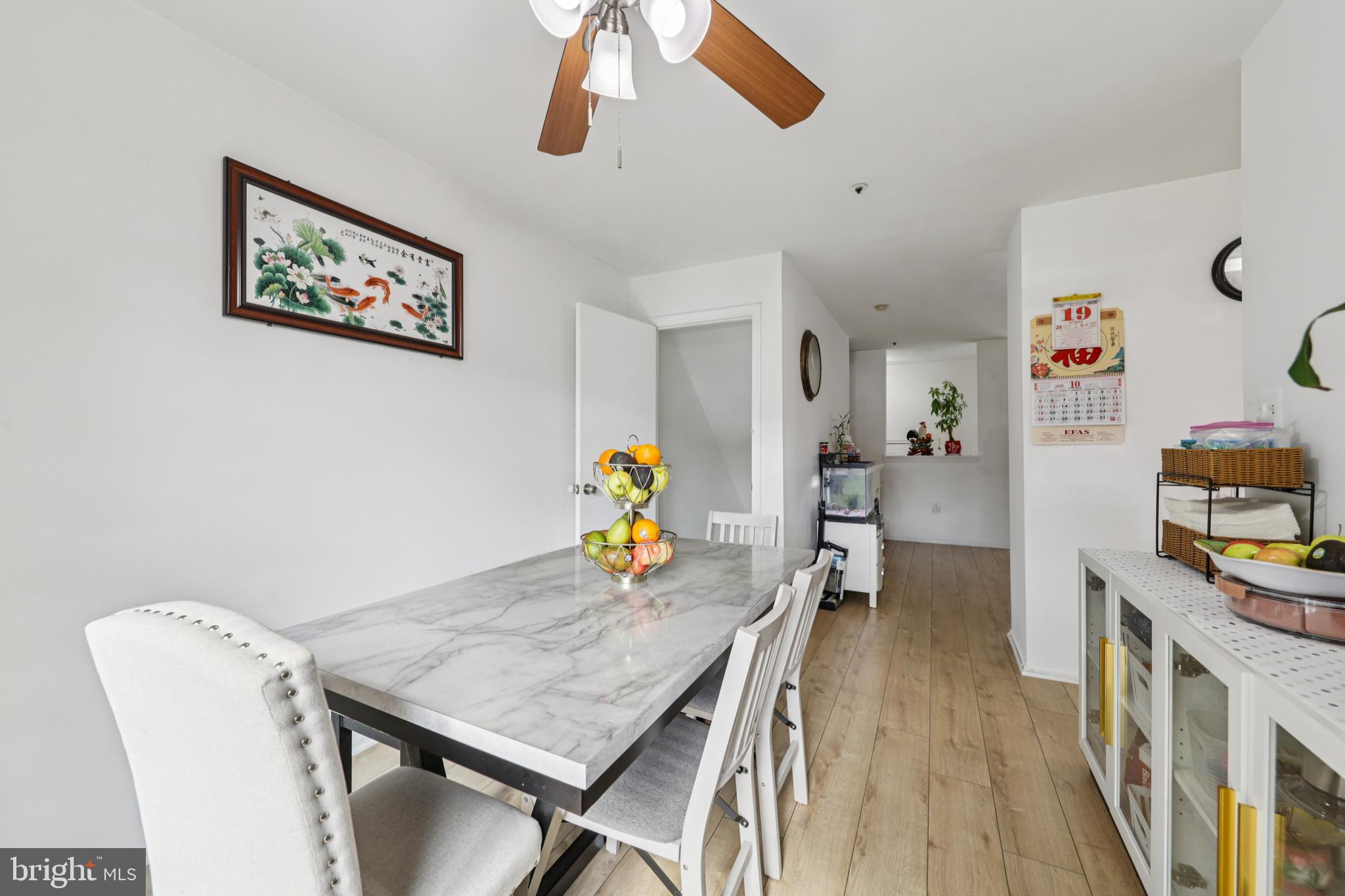 12014 Swallow Falls Court Silver Spring, MD 20904 - Photo 10 of 48 a view of a dining room with furniture and wooden floor