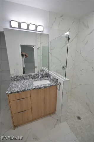 a bathroom with a sink and toilet