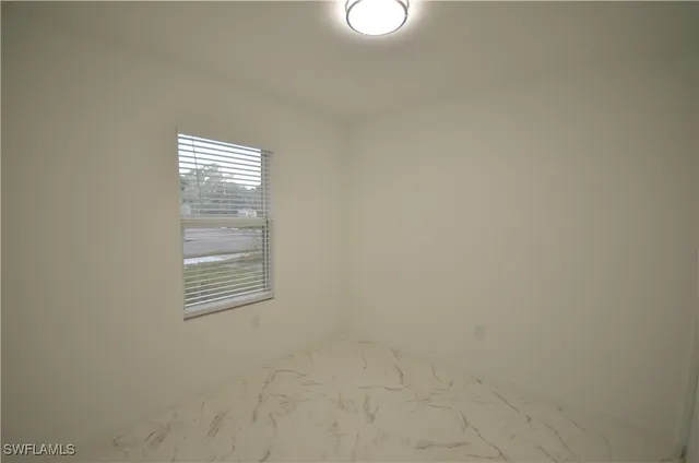 a view of empty room with window