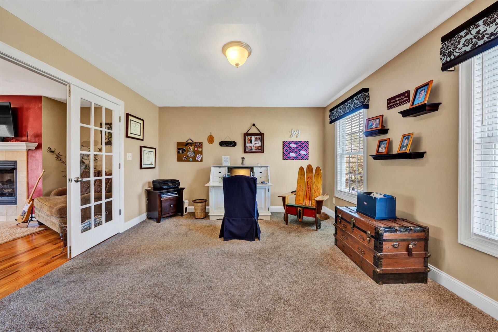 60 Green Level Road Boones Mill, VA 24065 - Photo 11 of 53 a living room with furniture and a flat screen tv