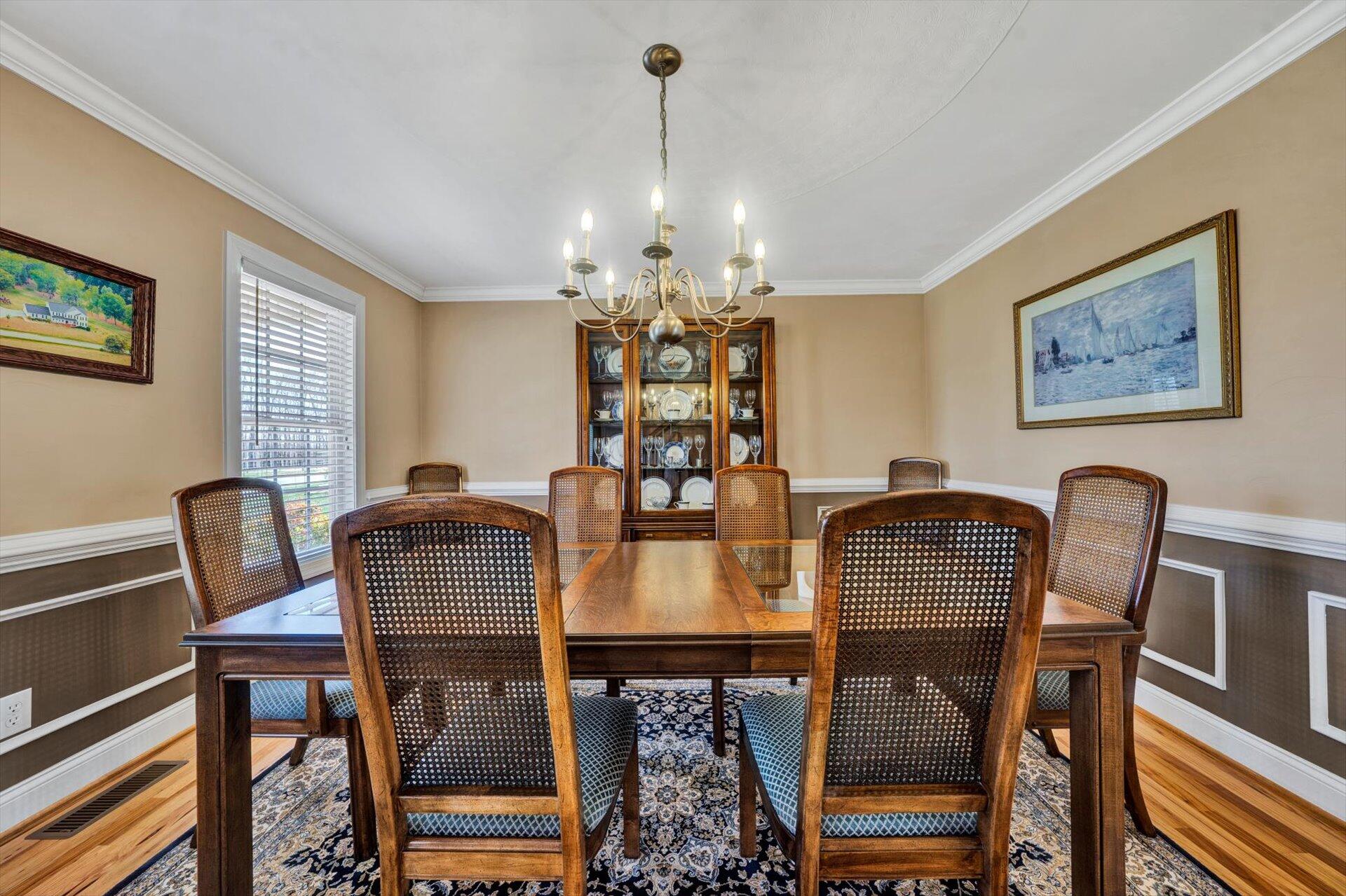 60 Green Level Road Boones Mill, VA 24065 - Photo 27 of 53 a view of a dining room with furniture and chandelier