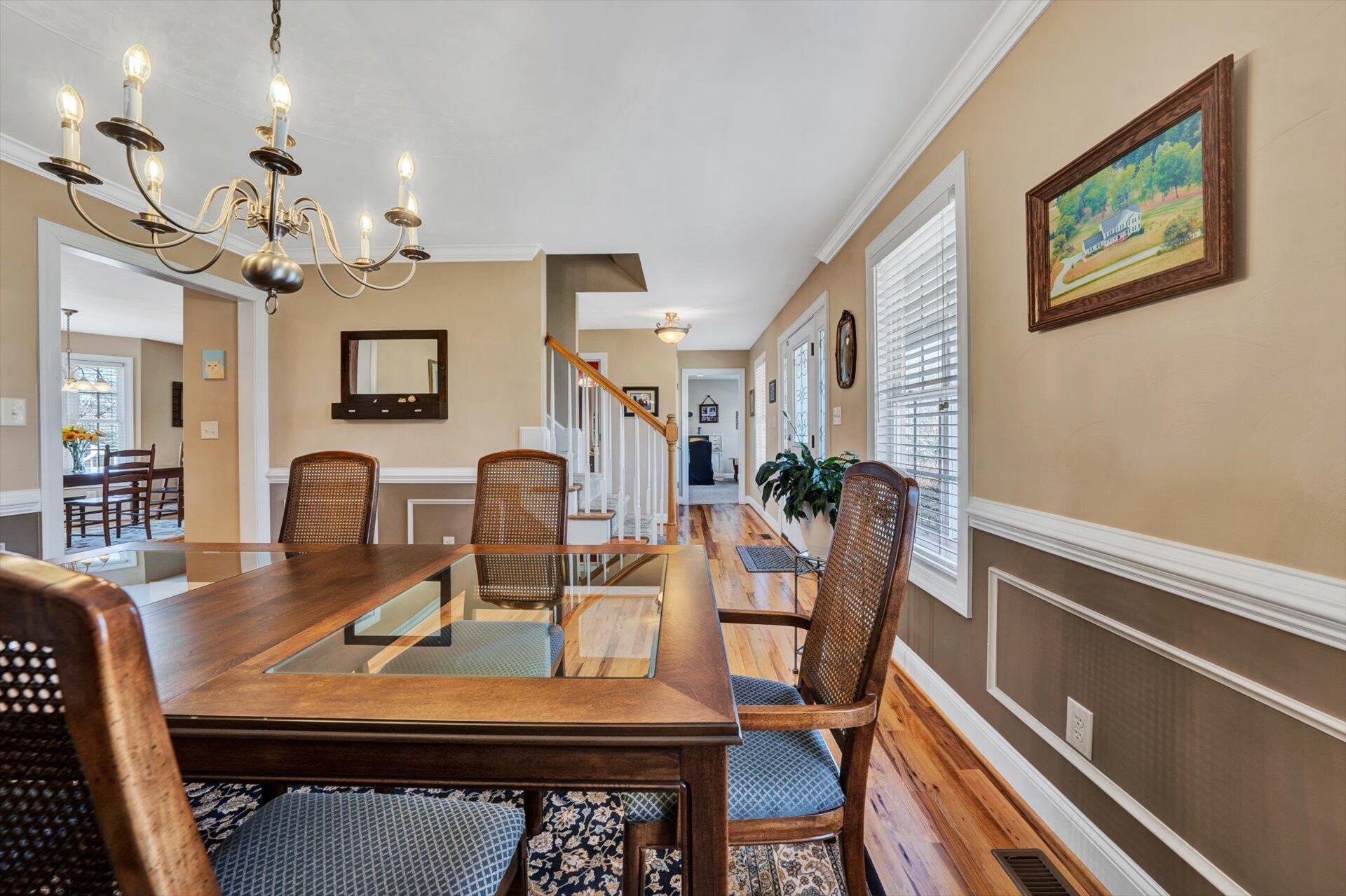 60 Green Level Road Boones Mill, VA 24065 - Photo 29 of 53 a view of a dining room with furniture and a chandelier