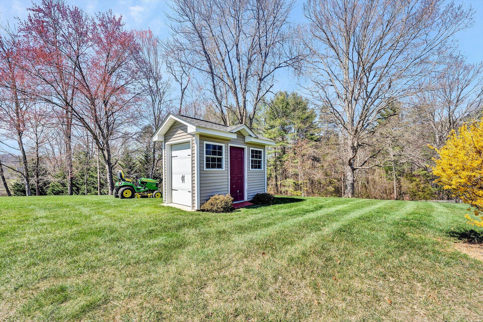 60 Green Level Road Boones Mill, VA 24065 - Photo 47 of 53 a view of a house with a big yard and large trees