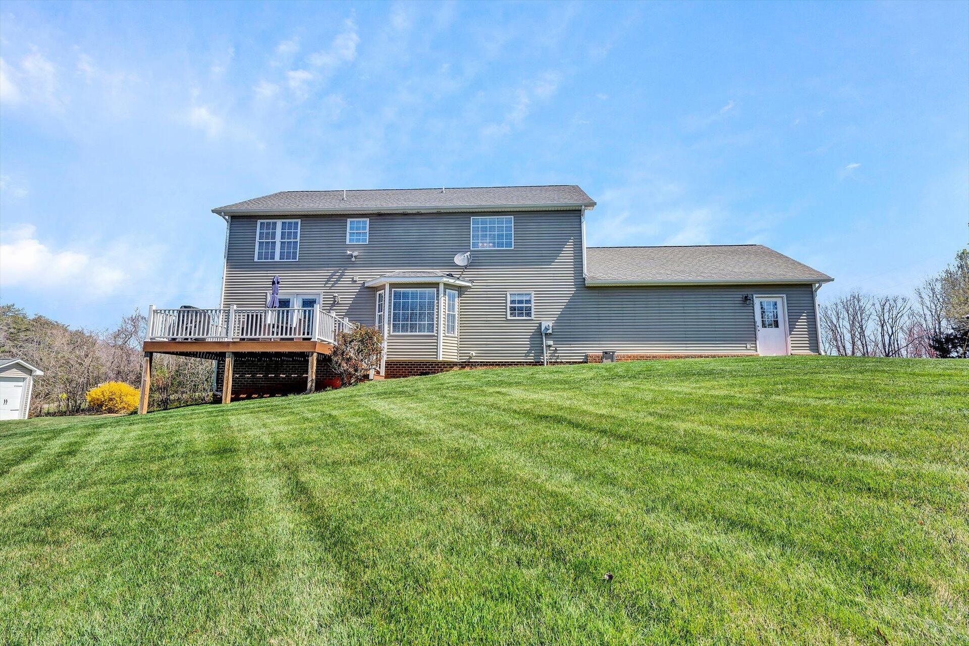 60 Green Level Road Boones Mill, VA 24065 - Photo 50 of 53 a house view with a garden space