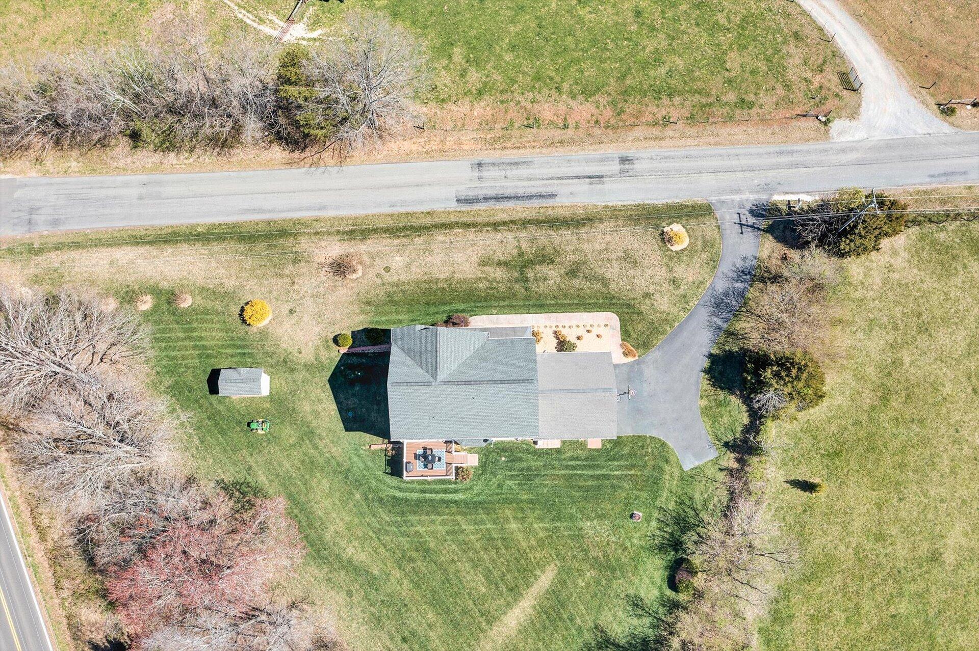 60 Green Level Road Boones Mill, VA 24065 - Photo 52 of 53 a view of a lake with a yard