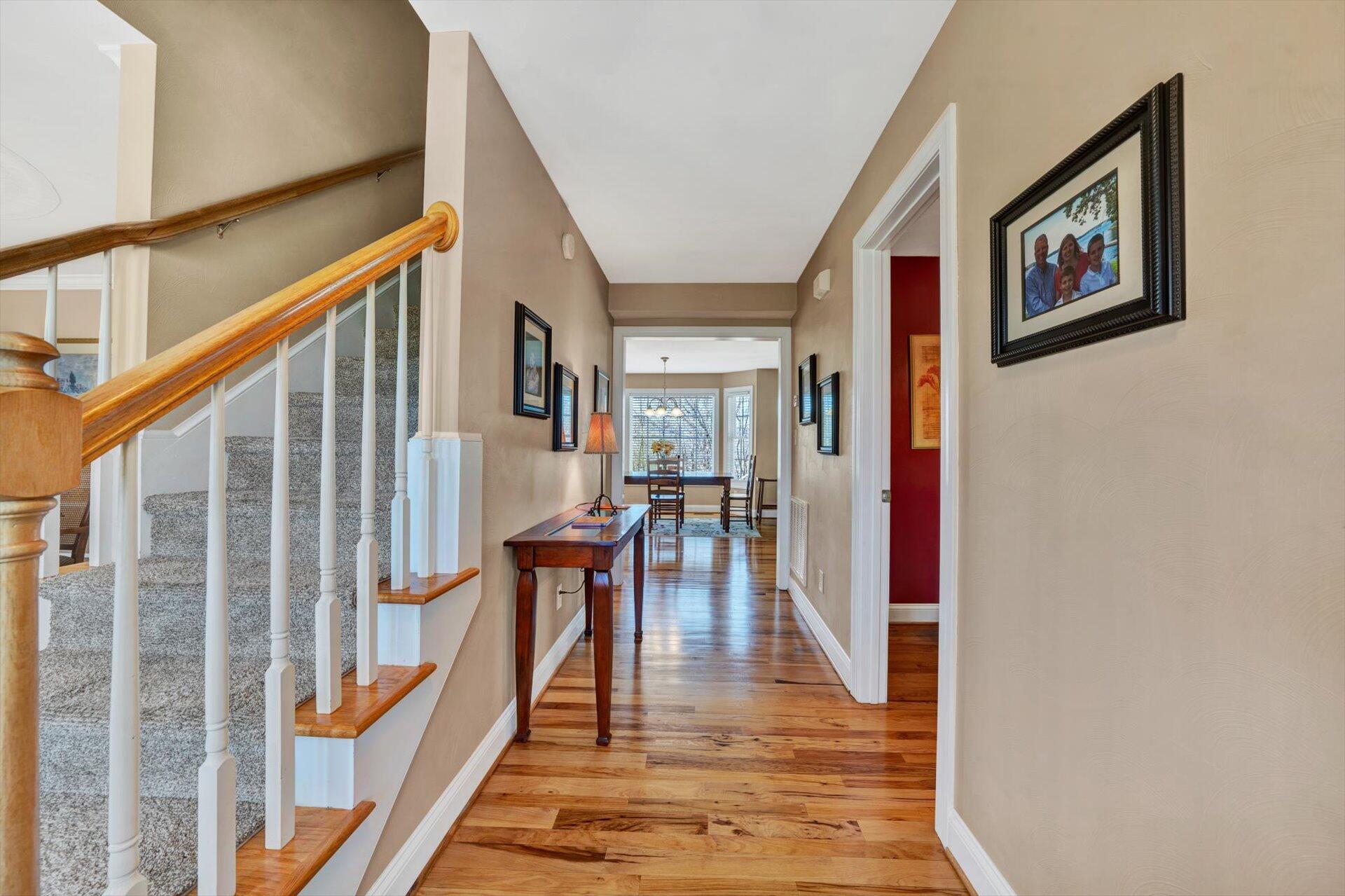60 Green Level Road Boones Mill, VA 24065 - Photo 9 of 53 a view of a hallway with wooden floor and stairs