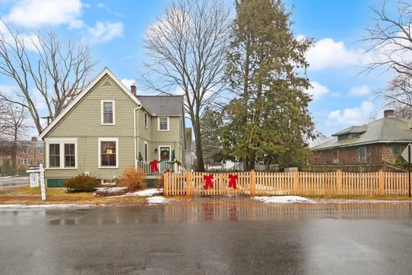 a front view of a house with a outdoor space