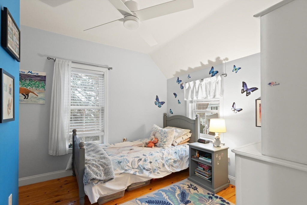 142 Railroad Avenue Hamilton, MA 01982 - Photo 18 of 29 a bedroom with furniture and a bed