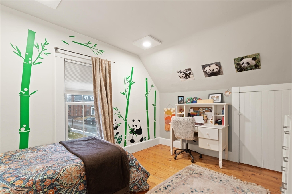 142 Railroad Avenue Hamilton, MA 01982 - Photo 20 of 29 a bedroom with a bed furniture and a window