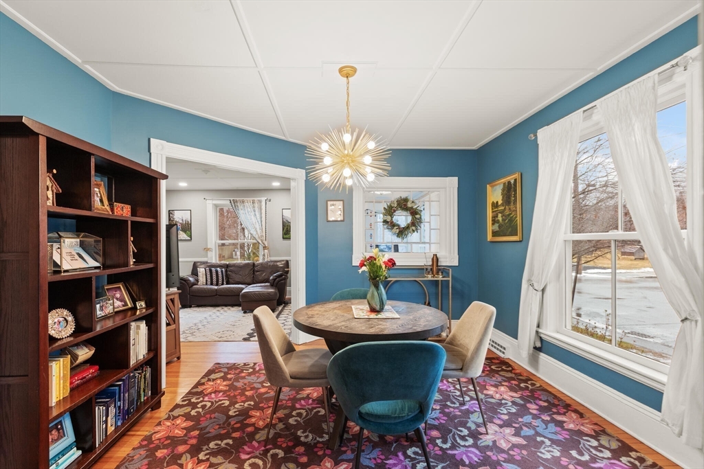142 Railroad Avenue Hamilton, MA 01982 - Photo 8 of 29 a view of a dining room with furniture window and wooden floor
