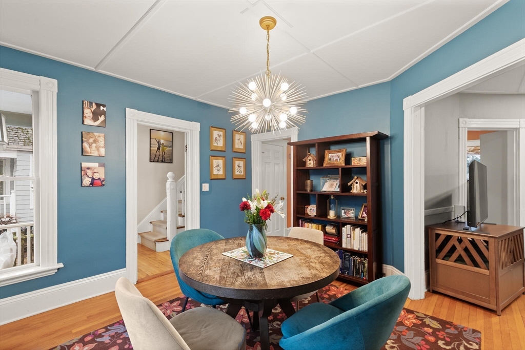 142 Railroad Avenue Hamilton, MA 01982 - Photo 9 of 29 a living room with furniture and wooden floor