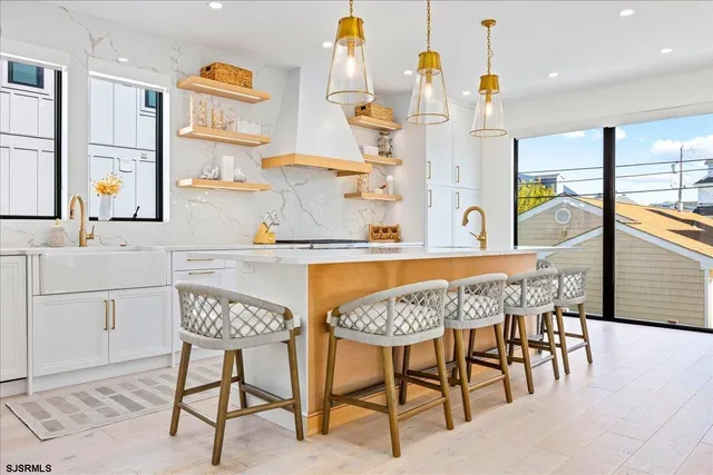 a bedroom with a bed couch and a window