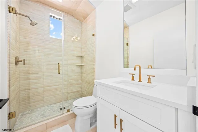 a front view of a house with a yard outdoor seating and kitchen view