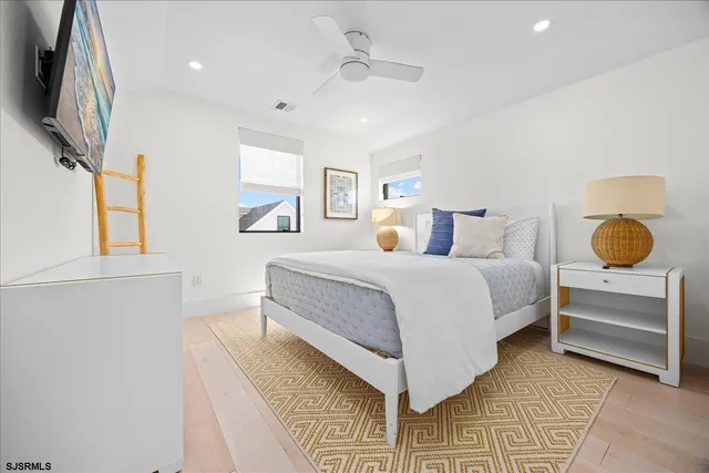 a front view of a residential apartment building with a yard