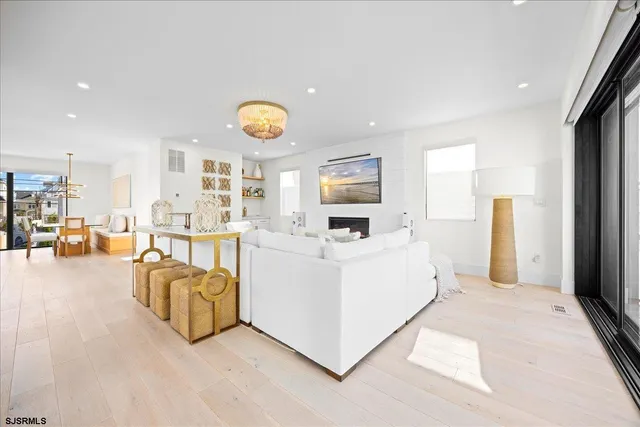 a balcony with furniture and a view of city