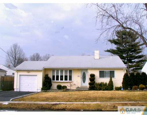 30 Albemarle Road Colonia, NJ 07067 - Photo 1 of 7 a front view of a house with a yard
