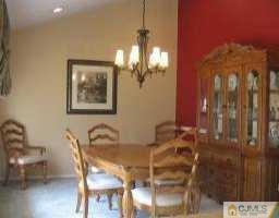 30 Albemarle Road Colonia, NJ 07067 - Photo 2 of 7 a dining room with furniture and wooden floor