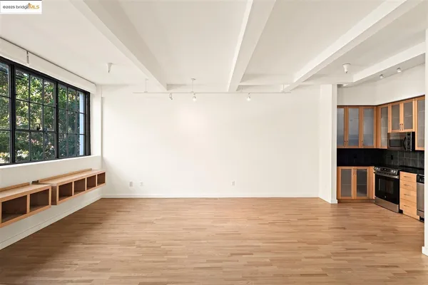 a view of workspace with wooden floor