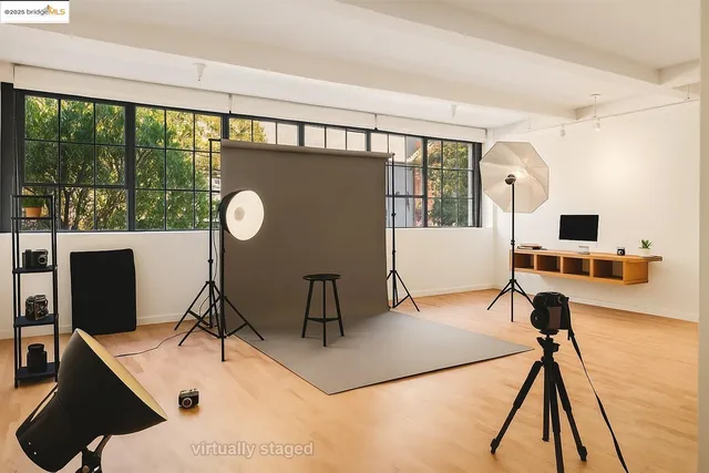 a workspace with furniture and wooden floor