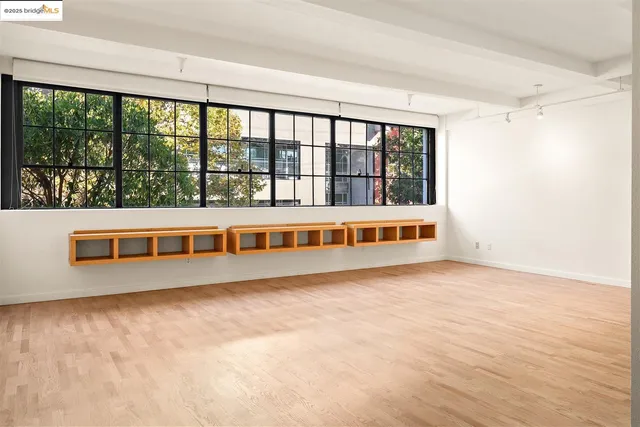 a view of a workspace with furniture