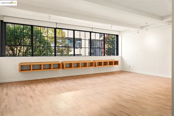 an empty room with windows