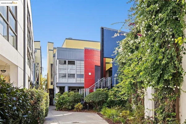 a sign broad in front of a brick building