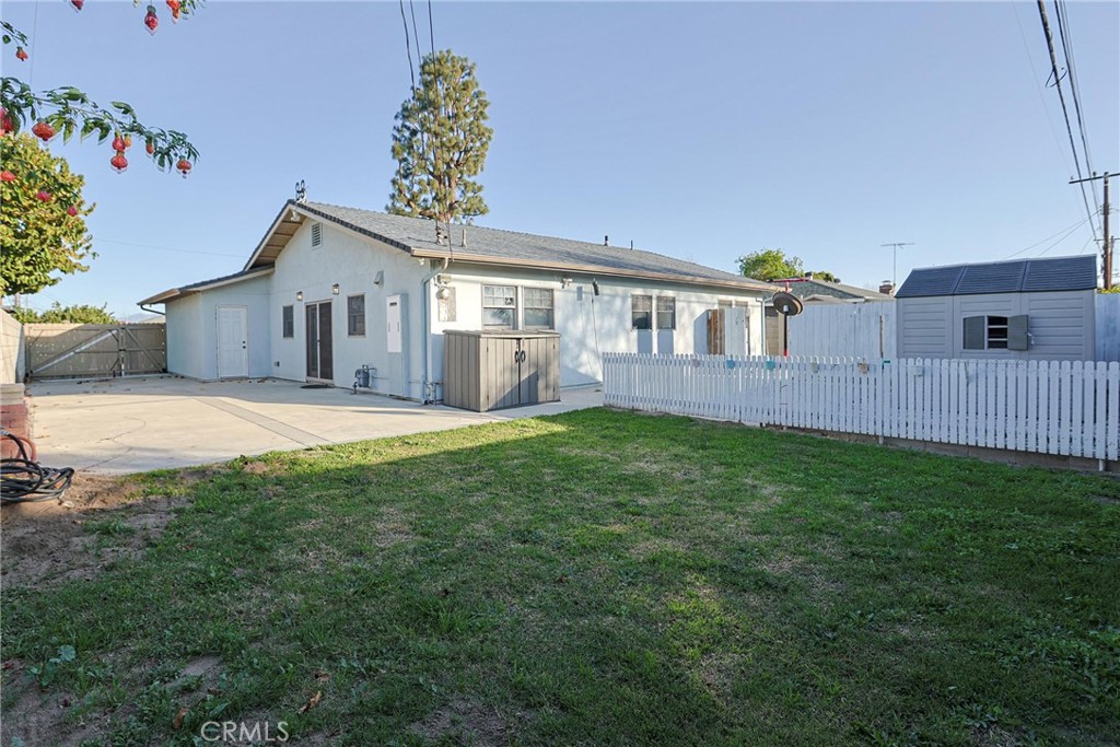 1014 Sheffield Street Santa Ana, CA 92703 - Photo 20 of 21 a front view of a house with garden
