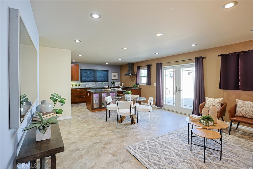 1014 Sheffield Street Santa Ana, CA 92703 - Photo 4 of 21 a living room with furniture and a flat screen tv