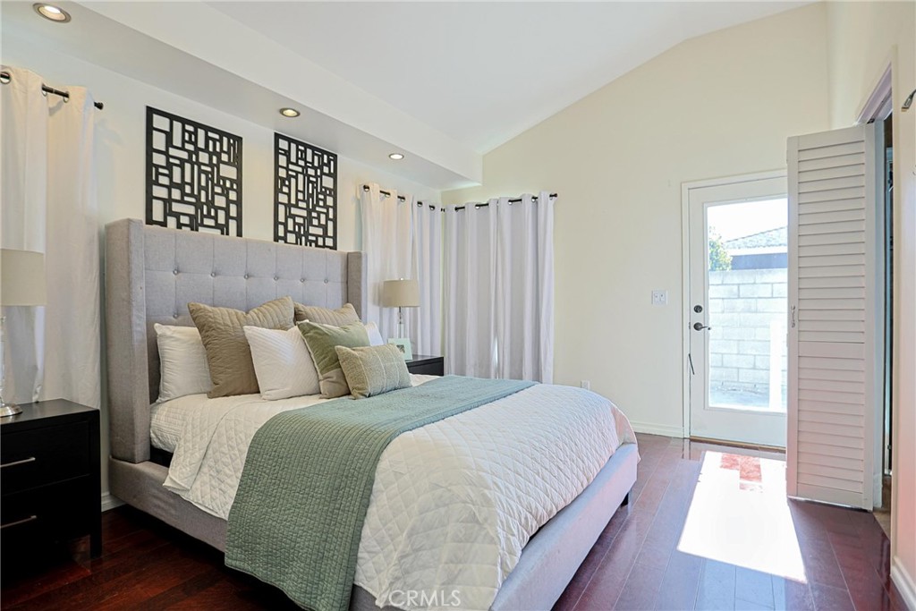 1014 Sheffield Street Santa Ana, CA 92703 - Photo 10 of 21 a large bed sitting in a bedroom next to a window