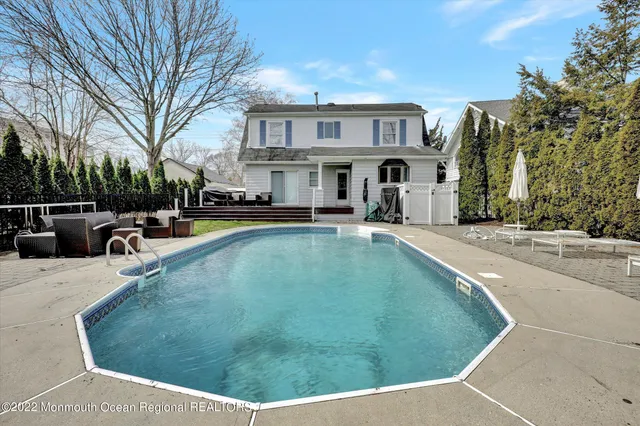 a view of a house with swimming pool