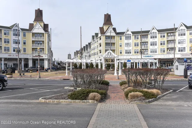 a front view of a building with glass windows