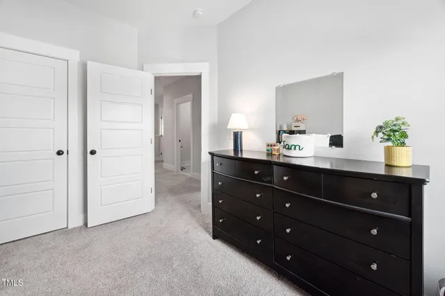 a bathroom with a double vanity sink and mirror
