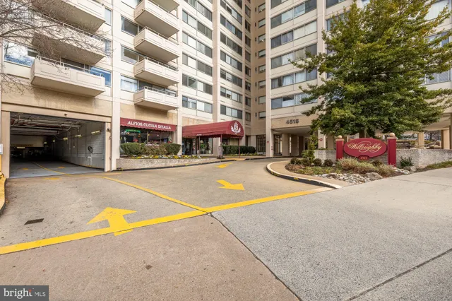 a building with trees in front of it
