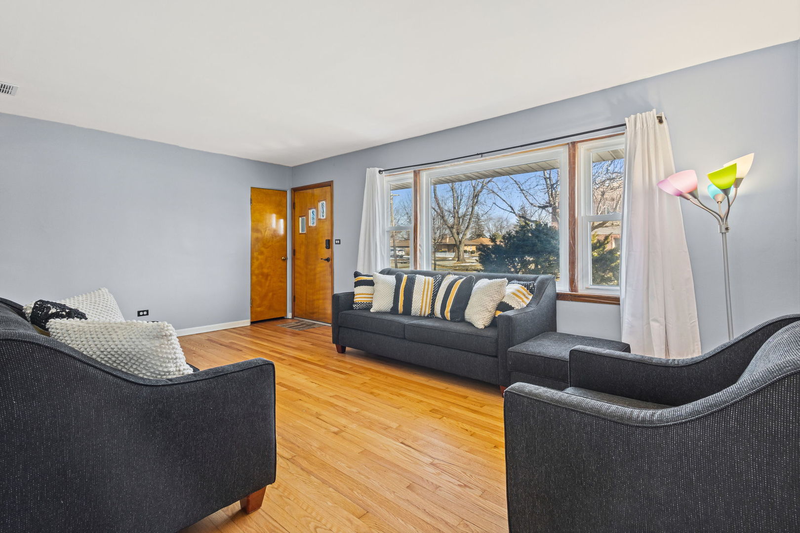 5901 108th Place Chicago Ridge, IL 60415 - Photo 6 of 15 a living room with furniture and a window