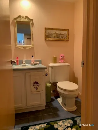 a bathroom with a toilet and a sink