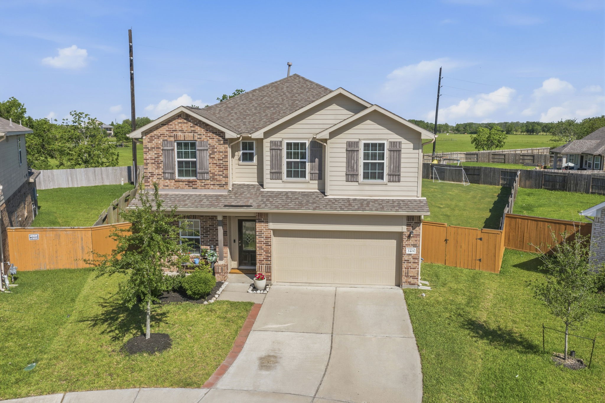 2401 Abbot Brk Drive Rosharon, TX 77583 - Photo 1 of 50 Situated on an expansive 0.3-acre cul-de-sac homesite, this exceptional property at 2401 Abbot Brook Drive backs to a serene greenbelt with no rear neighbors, offering a rare sense of privacy and tranquility. The oversized backyard provides an ideal setting for outdoor entertaining, recreation, and relaxed everyday living, with ample space to create your own private retreat.