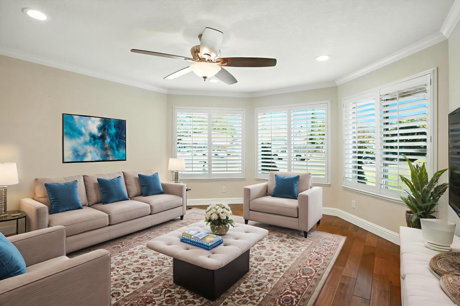 906 Ranch Road Galt, CA 95632 - Photo 4 of 37 living area with crown molding, wood-type flooring, ceiling fan, and recessed lighting, Virtuallly staged
