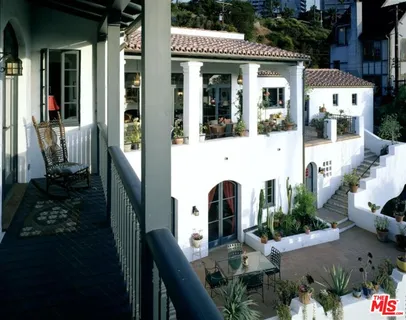a front view of a house with a porch