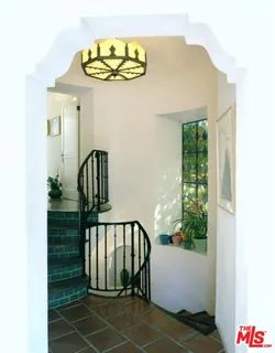 a view of staircase with window