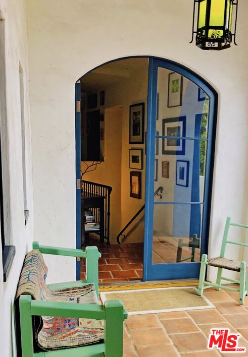 242 Mabery Road Santa Monica, CA 90402 - Photo 9 of 16 a front view of a house with outdoor seating