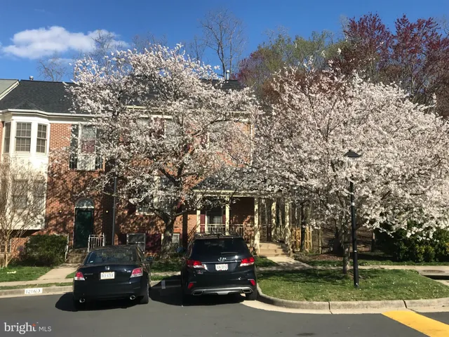 a car parked in front of a house