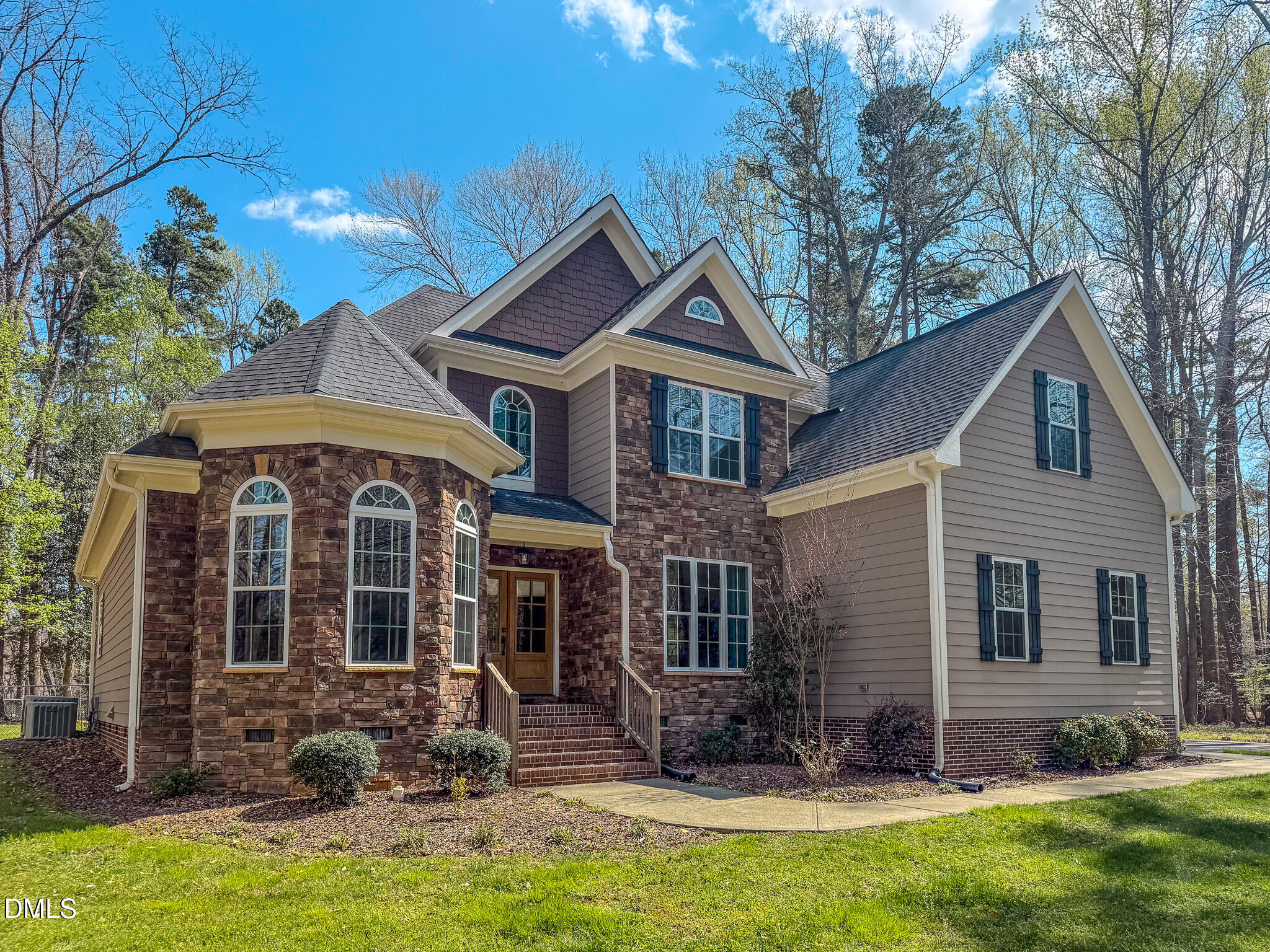 128 Cardens Cove Road Timberlake, NC 27583 - Photo 54 of 54 a front view of a house with a yard