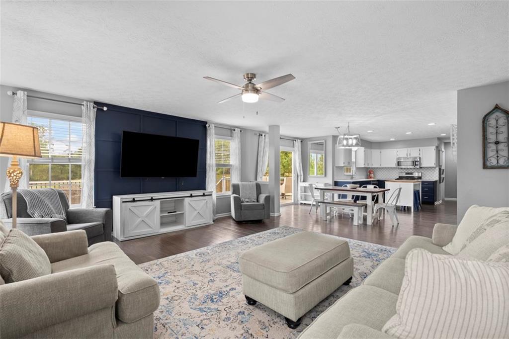 145 Brighton Lane Mars, PA 16046 - Photo 13 of 44 a living room with furniture and a flat screen tv