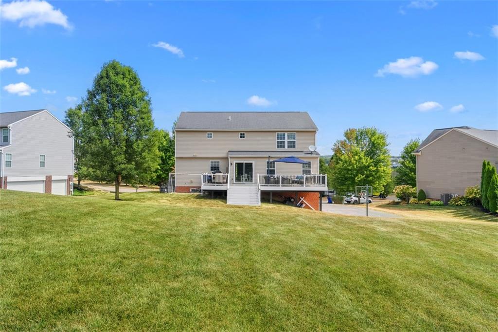 145 Brighton Lane Mars, PA 16046 - Photo 38 of 44 a view of a house with pool and a yard